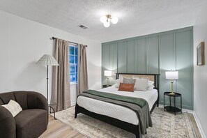 upstairs bedroom with queen bed
