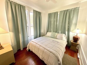 Bedroom 2 with Queen bed and private attached shower.