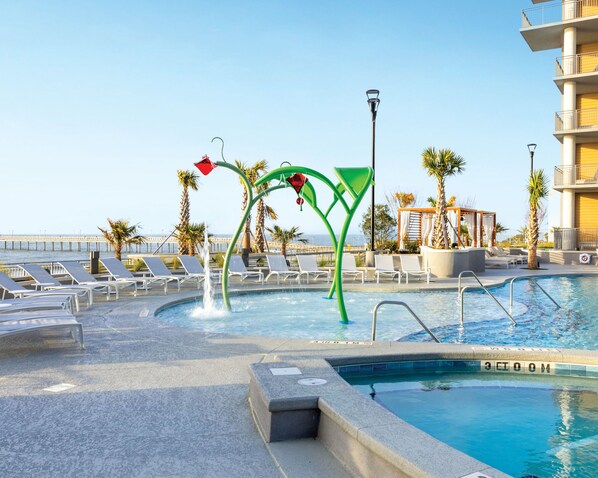 Soak up the sun in the poolside area with comfortable lounge chairs and ocean views.