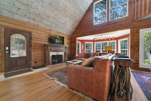 Relax in this cozy and spacious living room, comfortable leather seating.