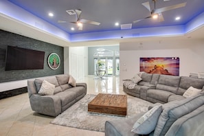 Living Room | Smart TV | Books/Board Games | Wood-Burning Fireplace