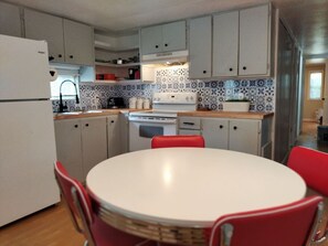 This retro diner table invites nostalgia--- gather round with friends and family and take a trip down memory lane over a great home-cooked dinner or breakfast.