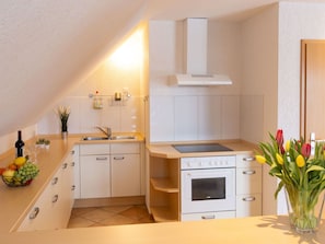 Kitchen, Interior Design, Furniture, Wood, Flooring, Countertop, Ceiling, Kitchen Appliance, Floor, Cabinetry