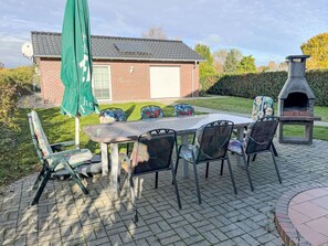 Sky, Table, Furniture, Cloud, Property, Plant, Building, Window, Chair, Outdoor Table