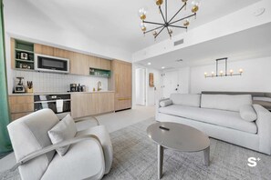 Spacious living room area with a separate dining area 