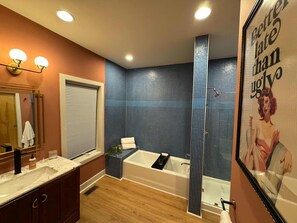 Full Bathroom 1: Inviting bathroom with a tub, ideal for relaxing after a long day
