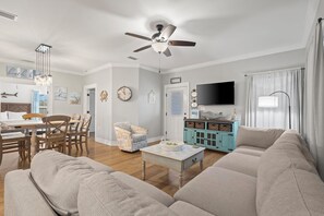 Living Area - The open concept design of this spacious cottage offers plenty of space for each member of your group and ensures quality time can be spent together during your stay.