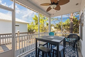 Large Screened Porch - A spacious screened porch with plenty of seating is featured for spending time outdoors without having to battle the outdoor elements.
