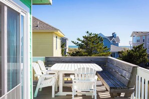 Deck dining with ocean view 
