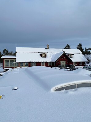 house and pool in winter