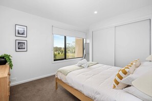 Bedroom 2 - with queen bed, storage and ensuite bathroom (shower and toilet)