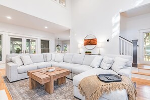 Open floor plan with vaulted ceilings and ample seating, wonderful for large groups