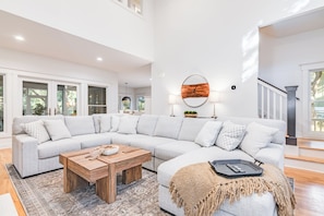Open floor plan with vaulted ceilings and ample seating, wonderful for large groups