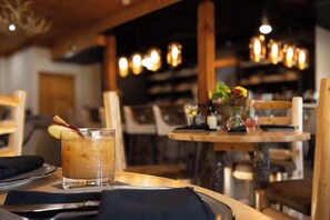 Enjoy craft cocktails and rustic charm at The Lodge Bar and Restaurant, where every detail enhances your dining experience.