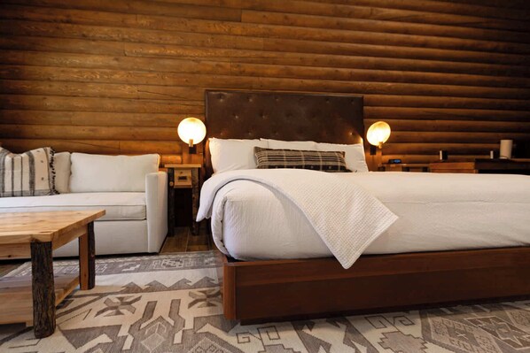 Diamond Tufted Leather Headboard paired with a Cool Walnut King Plinth Bed Frame

