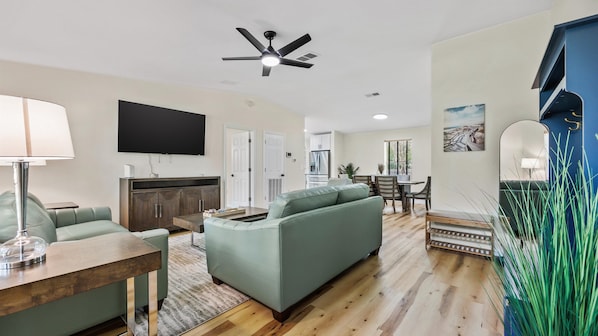 Curl up in the serene living room & stream all your favorite entertainment