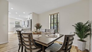 Gather for meals together at the dining table, with seating for 6