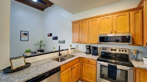 Fully stocked, convenient kitchen space