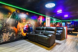 Stunning Avengers themed loft with a theater area and pool table