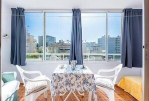 Charming closed terrace equipped with table and chairs to enjoy a delicious coffee and admire the vi