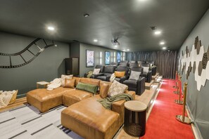 Premier theater room with a 120" screen for an immersive viewing experience.