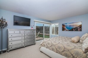 Master bedroom with a king size bed