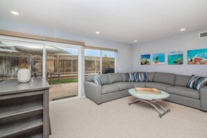 Large sectional overlooks the backyard