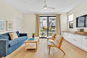 Enjoy a second TV and access to the front porch.