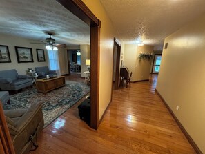 Entryway from front door and off the front porch. Sitting room.