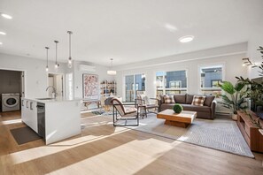 This 2 Bedroom + Queen Sofa Bed offers tons of natural light.