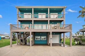 Spacious coastal retreat, 4 bedrooms, sleeps 14, just steps from the beach.