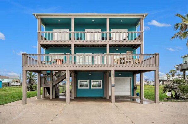 Spacious coastal retreat, 4 bedrooms, sleeps 14, just steps from the beach.