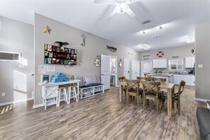 Spacious living, dining, and kitchen with a stylish island.