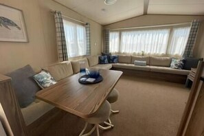 Dining and Lounge area - open plan and comfortable. The lounge does have a pull-out sofa bed too. 