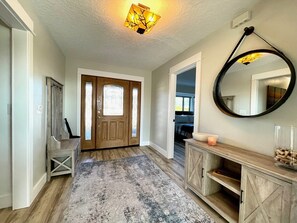 Main entry. Bedroom #2 entry pictured on right and hallway entry on left