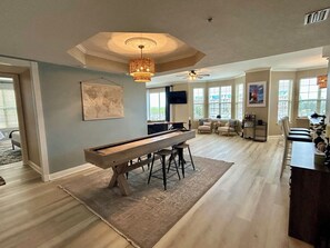 Open floor plan; from entry with sweeping marina view or game of shuffle board.