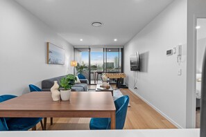 Beautiful walnut dining table with a comfortable seating bench—ideal for meals or casual gatherings