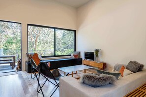This brand new, light-filled home is designed for comfort and connection to nature