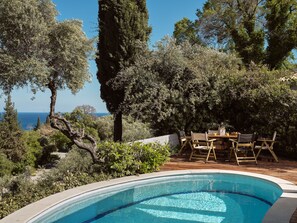 Unwind in the heated pool with panoramic countryside & sea views.