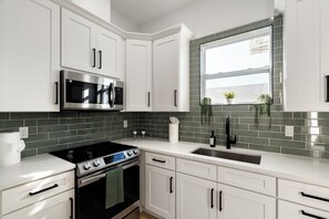 kitchen-
is  fully equipped with all you need to prepare your perfect meal