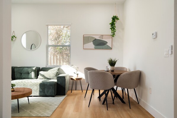 Living room area
dining table 4 chairs, sofa bed open to queen bed