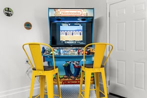 Bedroom #4 features a Large Arcade Game
