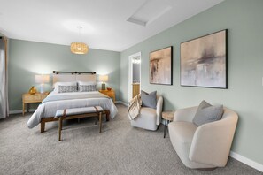 Master suite smart TV, private deck, seating area and on suite bathroom