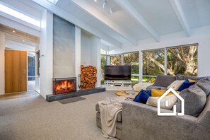 Cozy open fireplace, perfect for the winter months