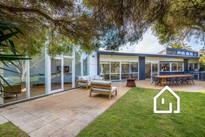 The property is nestled in a serene pet-friendly, fully fenced coastal setting