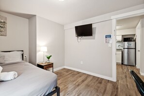 Indoors, Floor, Flooring, Screen, Lamp