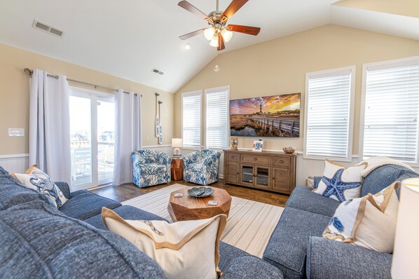 Comfortable Sofa & Loveseat with a 70" Samsung Smart TV