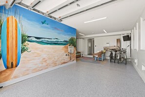 Take a group picture in front of the mural painted by a renowed local artist!