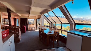 View from kitchen to dining table and living room
