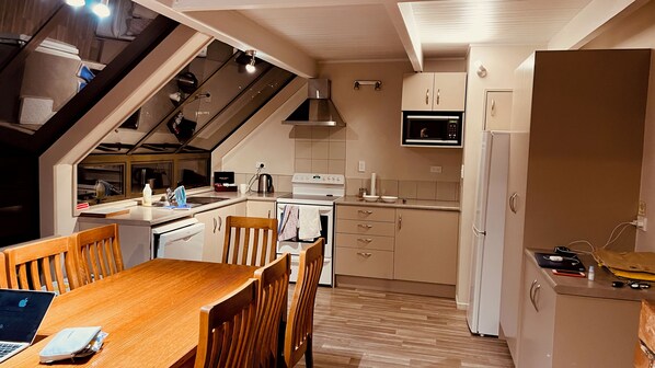 View of kitchen and dining table